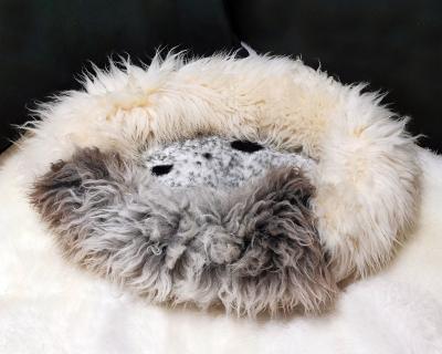 Dog beds. Animal sheepskin lair