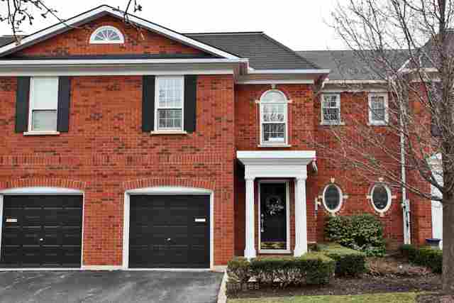 IMMACULATE TOWNHOUSE ON PRIVATE RAVINE LOT!
