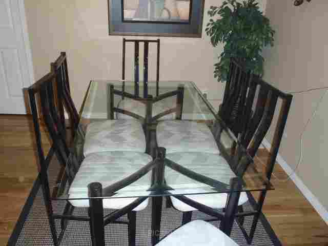 Elegant Dinning Room Table with Glass Top and 6 chairs
