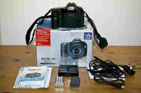 Buy New: Canon EOS 5D Mark II / Nikon D7000 DSLR Camera