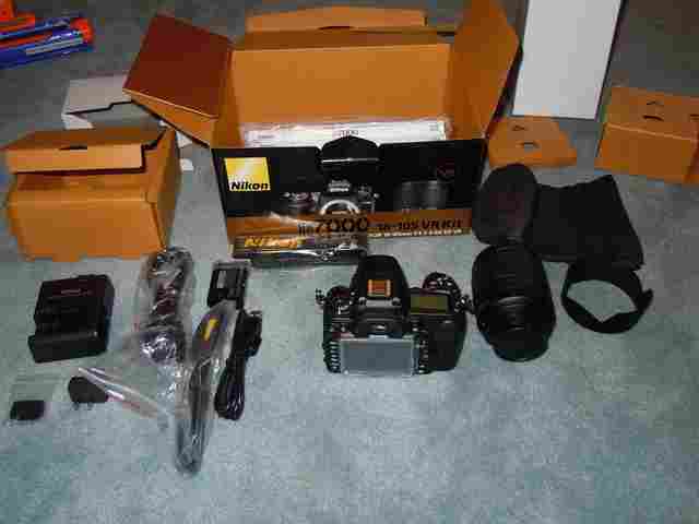 Buy New: Nikon D7000 / Canon EOS 5D Mark II