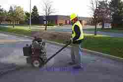 Do you want to seal asphalt cracks this winter? Contact Sure-Seal