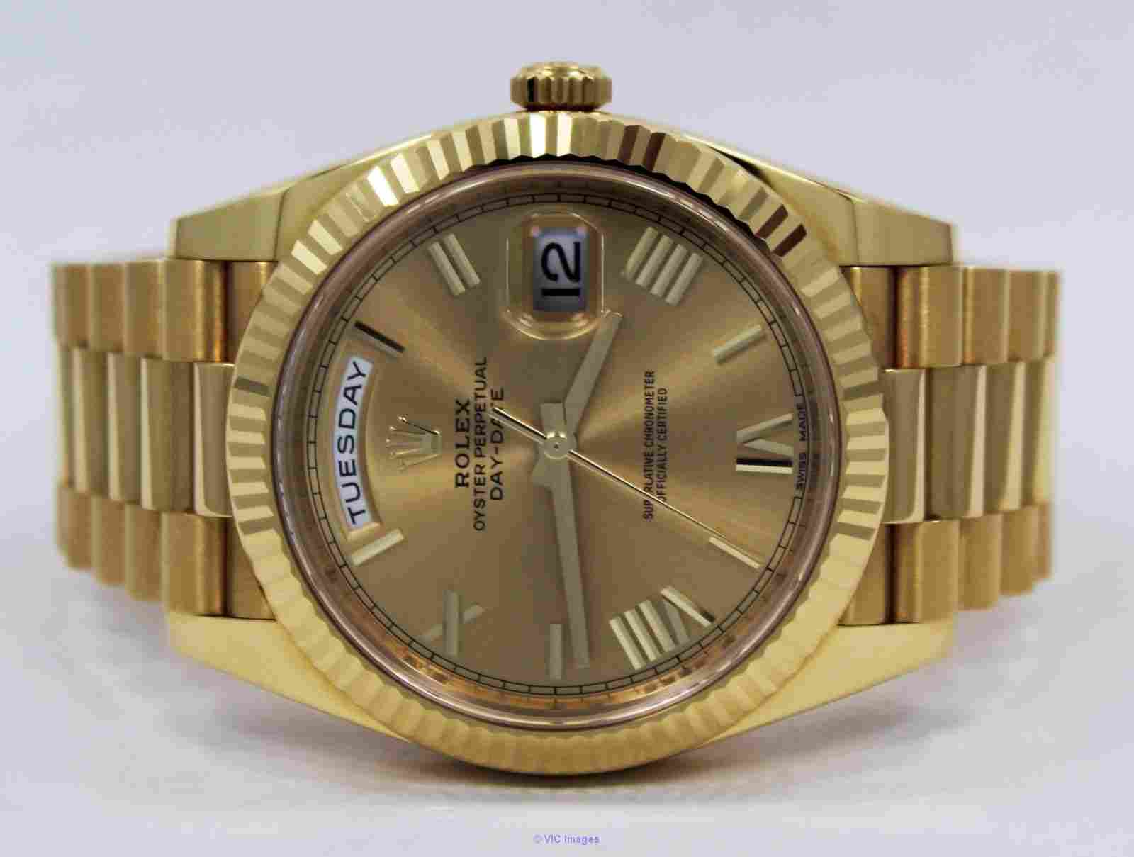 Rolex President 40mm Day-Date 228238 18K Yellow Gold Champagne Roman D