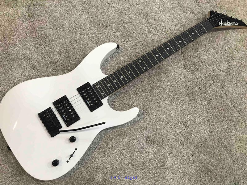 Jackson DINKY® Electric Guitar in Snow White + Soft Case & Book